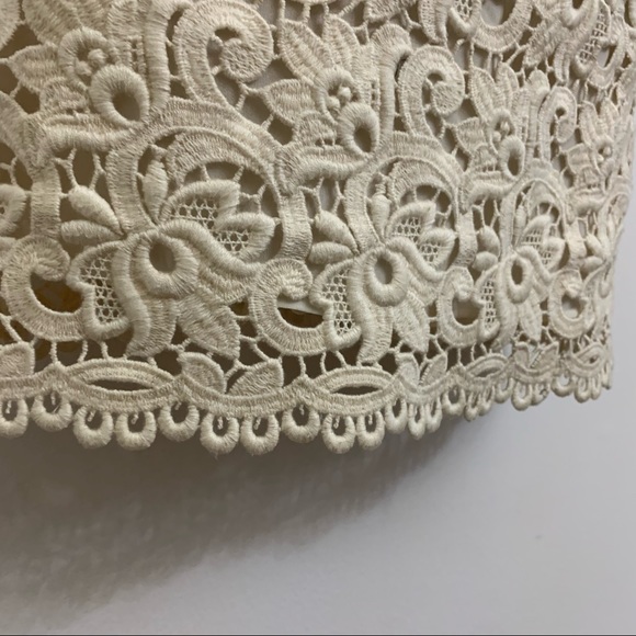 Ivory lace dress by Michael Kors is in like new condition. Size 2 - Picture 12 of 16